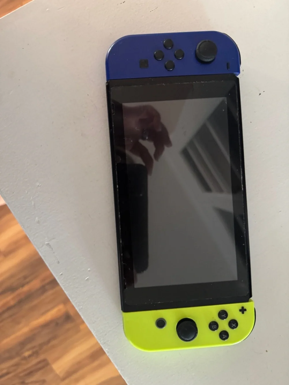 Nintendo Switch Handheld Console with Blue and Neon Yellow no cracks in screen )